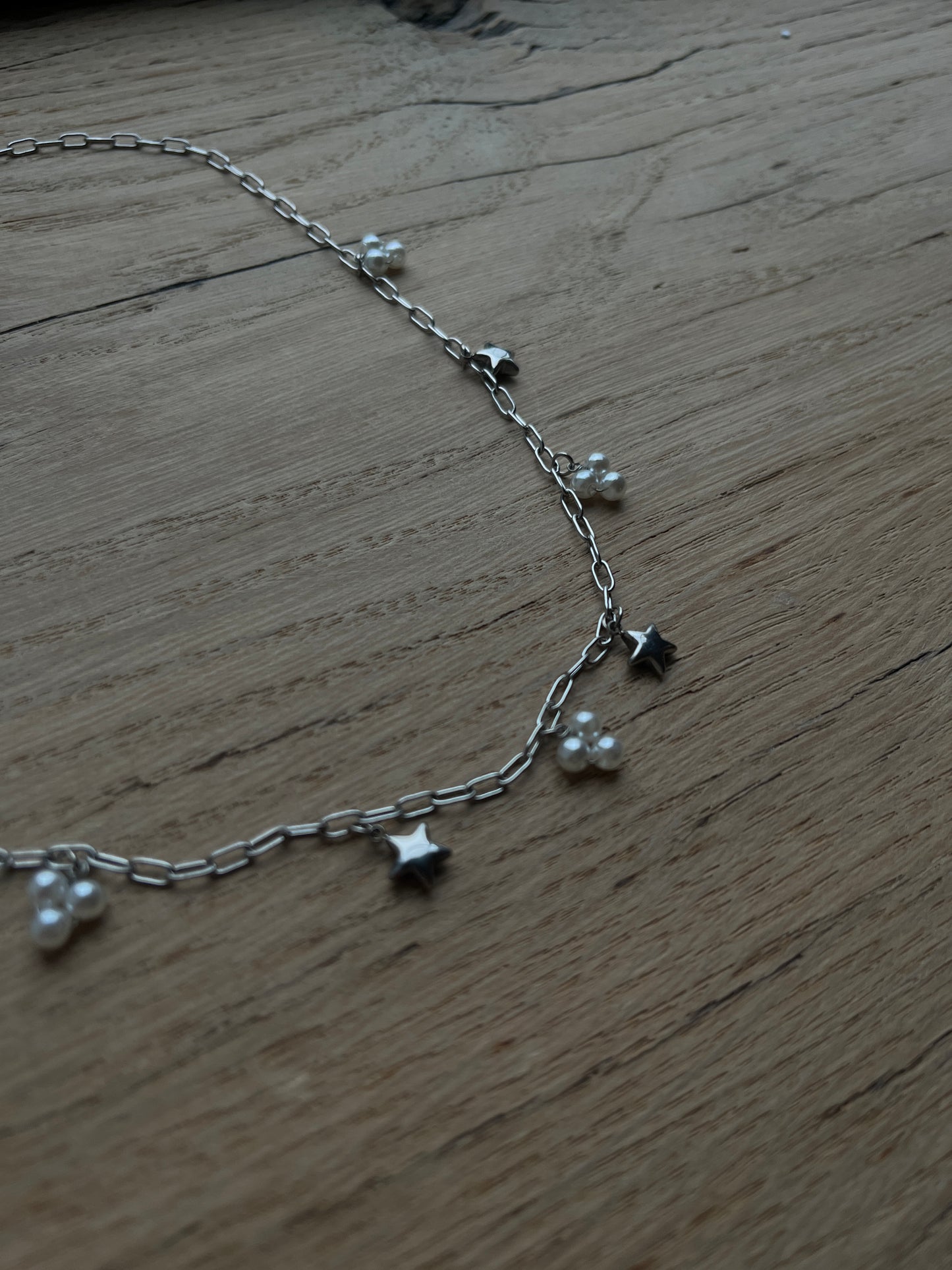 SCHAKELKETTING MET BEDELS ZILVER