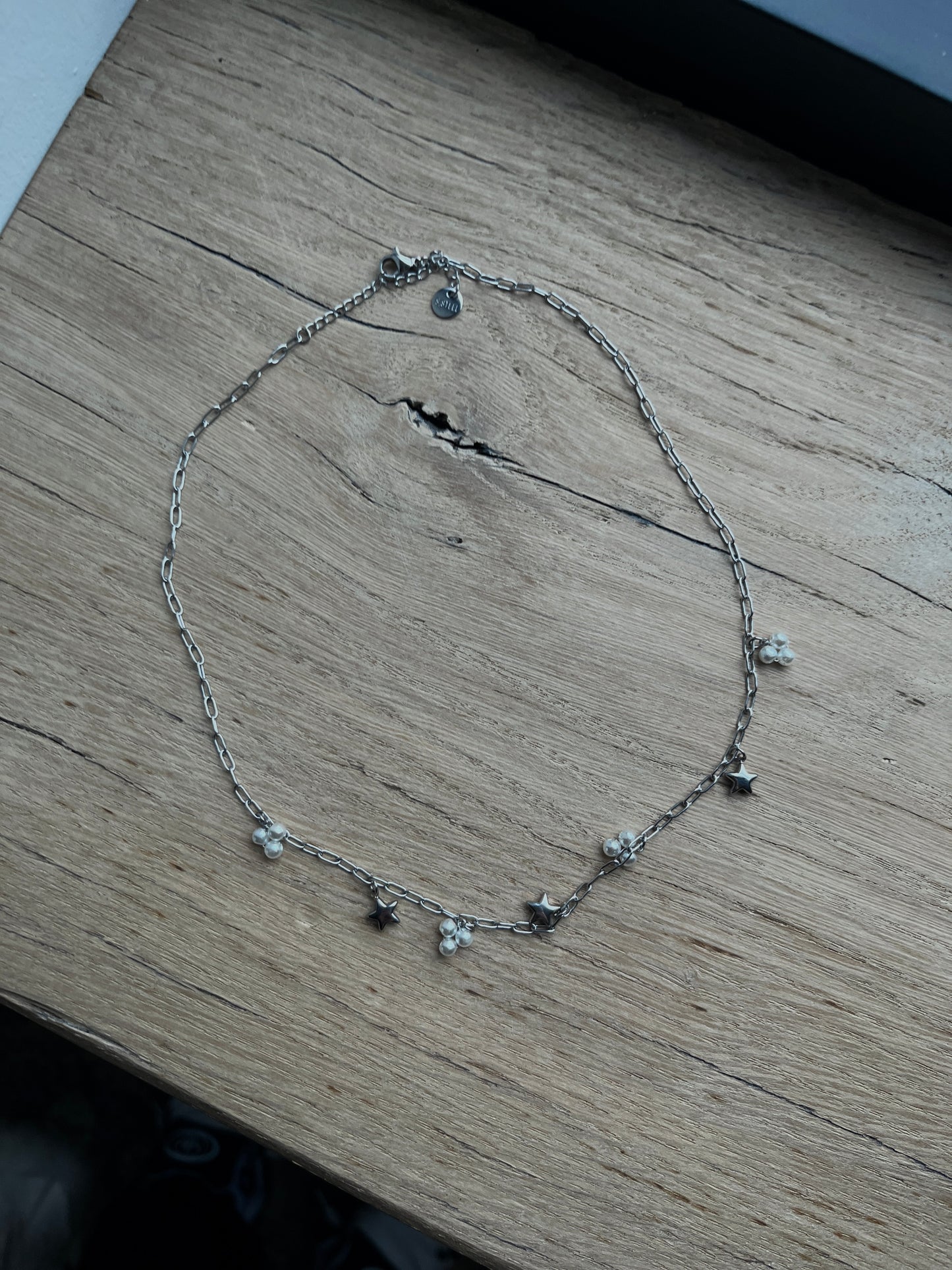 SCHAKELKETTING MET BEDELS ZILVER