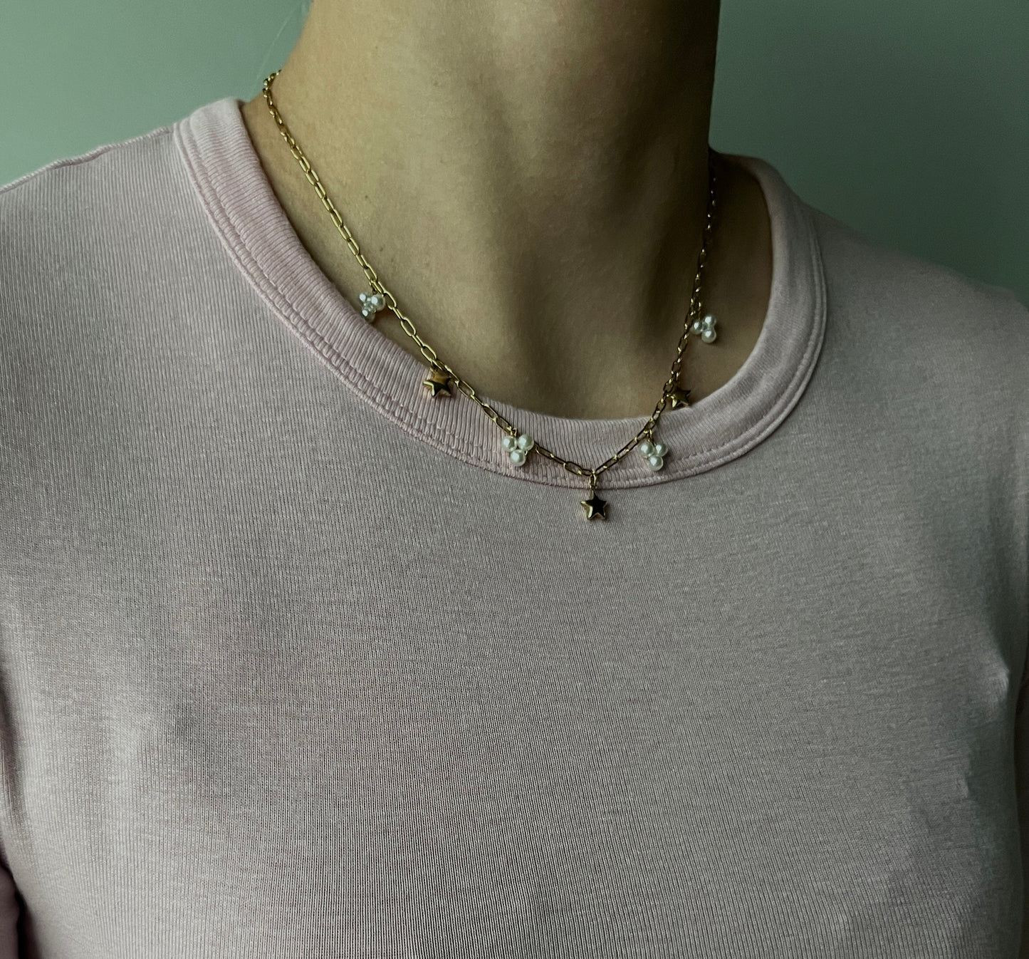 SCHAKELKETTING MET BEDELS GOUD
