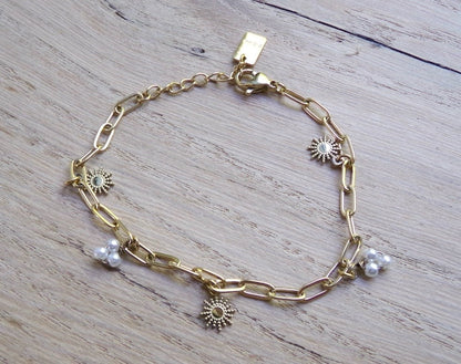 SCHAKELARMBAND MET BEDELS GOUD